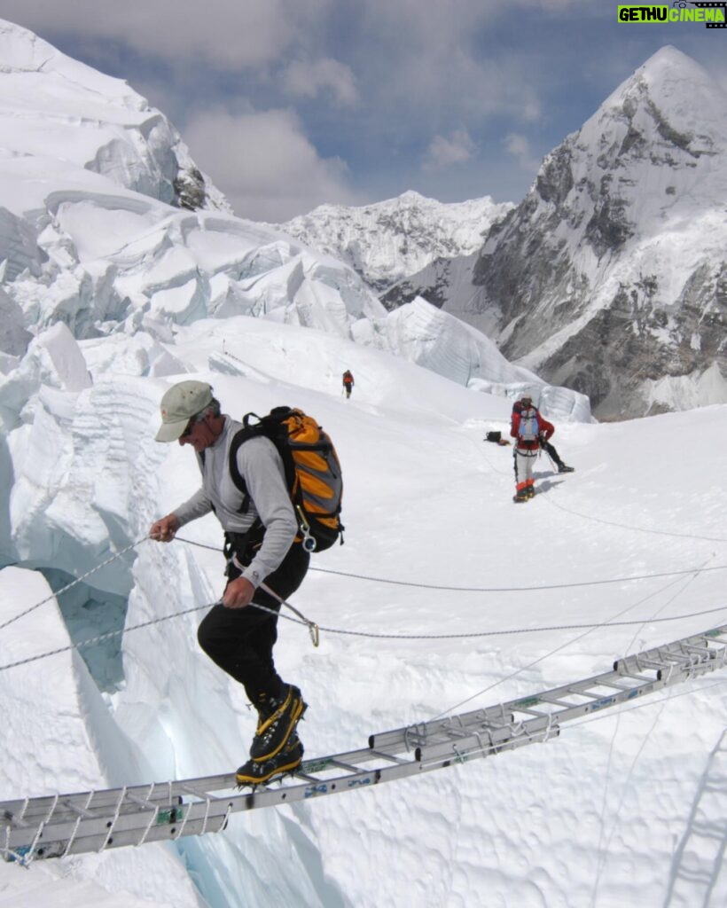 Jimmy Chin Instagram - Deeply saddened to hear about the passing of David Breashears this week. He was a friend and mentor and had an outsized influence on many peoples’ lives, including mine. I looked up to him long before I met him. His endeavors as an incredibly bold climber and world class mountaineer were legendary. He was also a human rights advocate, spokesperson for climate issues and someone I considered to be the greatest mountain filmmaker of our time. Among many notable films, David’s Everest IMAX film would become the highest grossing IMAX film of all time. It was a cultural phenomena for an entire generation. In 2004, David invited me to climb Everest and film with him, @edviesturs, Veikka Gustaffson and Robert Schauer. I was a long shot candidate to fill the role he was proposing. I was young and had just started filming the year before. It was a pivotal moment in my career. David was intimidating and opinionated but deeply caring and had a razor sharp wit. He was brilliant and, some would say, complex. His exacting standards and high expectations pushed me to rise to a new and much higher level both as a mountaineer and as a cinematographer. We eventually climbed Everest together that year and became close friends. I learned a lot on that expedition. He taught me how to approach a major production on a big expedition and the attitude and ethos required to pull off a challenging project in good style. These were lessons I’ve carried with me throughout my career. I am forever grateful that he believed in me and for my time with him. Here are a few images from the 2004 expedition including one of my favorite post Everest summit bad hair day images. Rest In Peace my friend. You will be dearly missed.