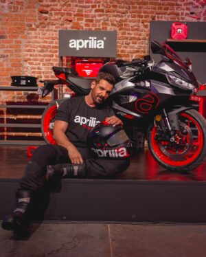 John Abraham Instagram - Welcome to the Racing Squad! 🔥

Excited to announce @thejohnabraham as the newest member of the Aprilia India family. Thrilled to have a powerhouse who embodies our ethos of performance and style. Fasten your helmets—it’s going to be an epic ride! 🏍️💨
 #ApriliaIndiaxJohnAbraham #ApriliaIndia #RS457