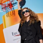 Josefina Montané Instagram - Descubriendo la protección solar avanzada con los mejores 🧡 @eucerincl Foto @titahost Vestuario @wendypozolondress