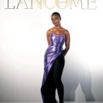 Joy Sunday Instagram - only the latest @laquan_smith for the latest @lancomeofficial girl ✨💜 last night was magical. I’m so lucky to have shared this moment with my family. I’m grateful to all the spirits that made us feel at home. Thank you to Sheika for fixing my makeup every 3 seconds since I kept tearing up 🤣 and shoutout to the only @kamkorderz for making my mama radiant! I know yall are tired of the novels, so I’ll keep it simple, beautiful. thank you. 🌹🤍 #lancome #makeupbysheiks #joysunday