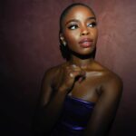 Joy Sunday Instagram - only the latest @laquan_smith for the latest @lancomeofficial girl ✨💜 last night was magical. I’m so lucky to have shared this moment with my family. I’m grateful to all the spirits that made us feel at home. Thank you to Sheika for fixing my makeup every 3 seconds since I kept tearing up 🤣 and shoutout to the only @kamkorderz for making my mama radiant! I know yall are tired of the novels, so I’ll keep it simple, beautiful. thank you. 🌹🤍 #lancome #makeupbysheiks #joysunday