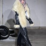 Julia Fox Instagram - PRESSIAT « ECHO » FALL WINTER 2024 Thank you so much for your kindness and your support queen @juliafox 🤍🤍 special up cycling couture dress with car tire Love u Photo @bobby_pap_la Talent Manager : @lena_crush @crush.services Style @losingpurity Assisted @daviddematty Hair @kevinjacotot and @beautick_official Makeup @snakeyez_ and @beautick_official Shoes @maisonernest Place @agenceforest Set design @anaisprofit Fashion & Creative Direction by @pressiat_ @vincent_pressiat Creative Production by @crush.services @lena_crush @badidhella__ Communications & Event Direction by Inspire Live @victoria_michaux @marinedge Creative Direction by @clementdezelus Music Direction & Creation by @imalayamusic @milamorgens @loulouxmusic @laurentsauvagnacmusic @sylvain_picart Casting Direction by @lena_crush @crush.services Casting Assistants by @badidhella__@charlesbeugniot Partnerships Direction by @juliegoyhe Press Direction by @tl.paris Executive Production by @_vanessac_13 3D by @nik_gundersen @crush.services E-vite & animation by @jones.paris.studio This season, Pressiat dared to entrust four talents, working in the fields of visual arts, technology, music, communications, and strategy, with total creative freedom. Together, they collaborated to bring to life a runway show that is both surprising and unique, an innovative fusion of ideas and diverse skills, amplifying the house’s vision and influence. This new collective intelligence reflects a shared dream of pushing back the boundaries of creativity and exploring new dimensions.