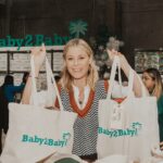 Julie Bowen Instagram – Such an incredible day volunteering at @Baby2baby packing bundles filled with diapers, hygiene items, warm jackets, toys and more for children who need it most. Sending a huge thank you to @kidoodletv for supporting my favorite nonprofit and making today possible! As a long-time Baby2Baby Board Member, I am so proud of the work we are doing to provide basic essentials to over one million children in need across the country this year.