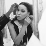 Jurnee Smollett Instagram - @jurneesmollett pregamed the @louisvuitton Spring 2024 show with a Beyoncé playlist and hot lemon water. In attendance, she wore a windbreaker-esque sleeveless jacket complete with a hood, juxtaposed with high-waisted fire-engine-red skinny pants, and topped it all off with a link-belt of exaggerated proportions across her midriff. “He finds a way within his silhouettes to create such a dance between the energies of the feminine and the masculine,” she muses about Louis Vuitton’s Creative Director @nicolasghesquiere. At the link in bio (or at coveteur.com), we get ready with Jurnee in her Paris hotel moments before the big show. Photographer: @artofv Writer: @camille_freestone Creative Producer: @talunzeitoun Stylist: @mandelkorn Hair Stylist: @naivashaintl Makeup Artist: @makeupvincent Location: @lebristolparis #LouisVuitton #JurneeSmollett