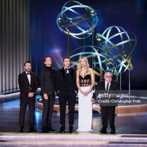 Kaitlin Olson Instagram - 75th annual Emmy Awards! We were happy to wait 75 years to be invited into the building. Congratulations to @robmcelhenney on his big @wrexhamfx wins and also for being very handsome. 
Hair: @hairbyabbyroll Makeup: @theadorable1 styling: @rhondaspiesstylist @laurabasci 
Dress @monotofficial 
Jewlery @nicolerosejewelry, @xivkarats, @dena_kemp, @zydoitaly
Clutch @rodofirenze
Shoes @larroude