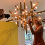 Karolína Kurková Instagram - Let there be LIGHT. 💡✨This piece is so special to me, not only because I designed it and collaborated alongside Maxim Velčovsky x @lasvitdesign , a Czech brand specializing in blown glass, but also because it reminds me of being a little girl and connecting me back to my childhood...blowing dandelions, making wishes. We named it "Pampeliska" which means dandelion.Thank you Léon for giving me the freedom and do something I have never done before #czechmade #blownglass #handmade #couture #kkstyle
