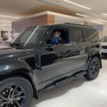 Katrin Tanja Davidsdottir Instagram - We bought our dream car! 😭😭✨ The third slide is from three years ago when we were getting my car serviced & we first saw an all-black Defender .. I took a photo of @brookslaich sitting in it & thought 💫ONE DAY💫 Since moving to Coeur d’Alene, we have been sharing one vehicle, so it also feels like I just grew wings! 🤍🪽 I AM SO HAPPY & thankful & excited for all the adventures to come in this one with my love!!!!!!!!