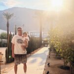 Kayla Ewell Instagram - The end of Summer & the beginning of my Birthday. ☀️ Sometimes you pack up the fam & take a last minute trip to Palm Springs right before school & a giant storm start. Family time is my favorite time. The kids loved every minute, including the car ride home. (We timed it perfectly & they slept the whole way home, little do they know that was the best present they could give.) •Dress & shoes are @zara •Jones’ trunks & oufit @zarakids •Onesie is our favorite @kytebaby •Bikini is @allsaints from a few years back & it’s still one of my favorites