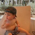 Kayla Ewell Instagram - The end of Summer & the beginning of my Birthday. ☀️ Sometimes you pack up the fam & take a last minute trip to Palm Springs right before school & a giant storm start. Family time is my favorite time. The kids loved every minute, including the car ride home. (We timed it perfectly & they slept the whole way home, little do they know that was the best present they could give.) •Dress & shoes are @zara •Jones’ trunks & oufit @zarakids •Onesie is our favorite @kytebaby •Bikini is @allsaints from a few years back & it’s still one of my favorites