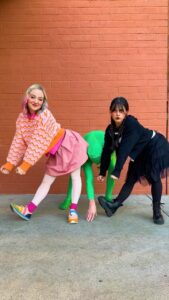 Kelli Erdmann Instagram - Thing shakin’ that thing👏 DC: @_.lakii._ #wednesdayaddams #wednesday #enid #thing #dance #behindthescenes #greenman #happykelli #kaushacampbell #runit #chrisbrown