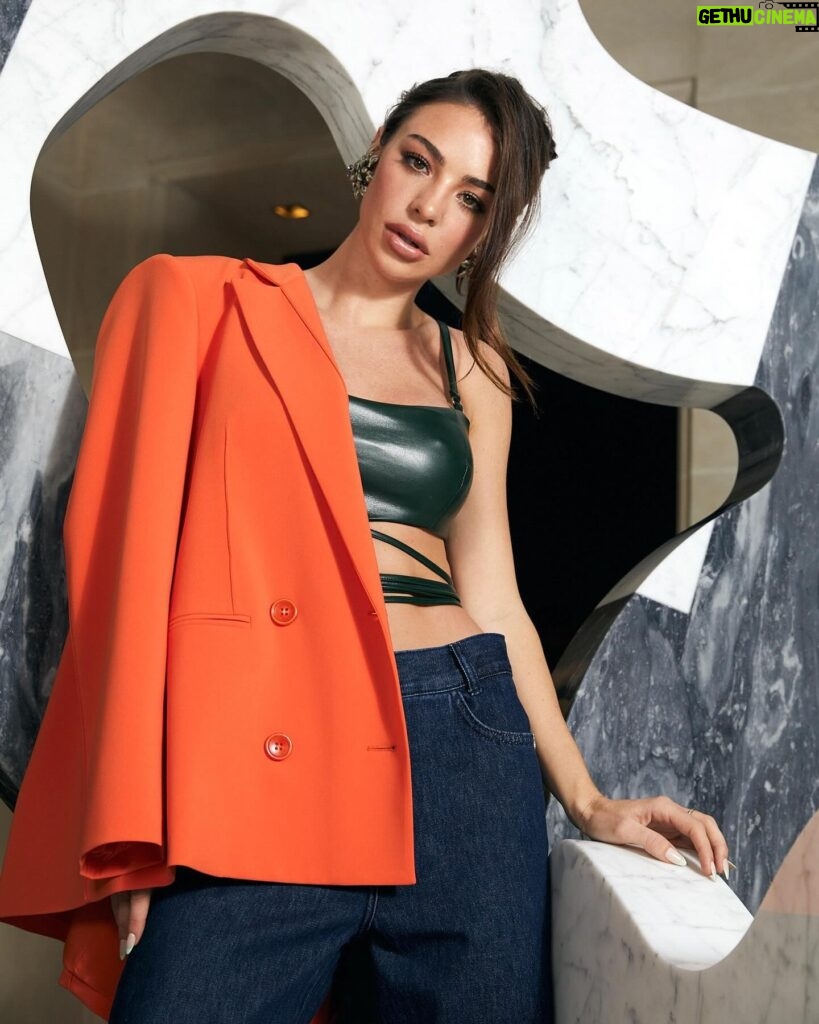 Kellyn Sun Instagram - March 20 will be the beginning of the Spring Season ! For this occasion, I wanted to show you a look @patriziapepe ideal for this transition winter to spring with this beautiful suit orange tangerine, this navy blue jeans rolled up at the bottom and this bottle green lace-up top that makes the look sophisticated and assertive for this new season ! @samuellstudio @williampicavet