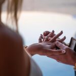 Kelsey Owens Instagram - WE’RE ENGAGED BABY!!!💍🤍 It’s crazy that a day I’ve dreamt about since I was a little girl has arrived. I think the younger me would be so happy to know she has a man who takes care of her, puts a smile on her face, and loves her like no one ever has before. Max…since the day I met you, you’ve never failed to surprise me and this day was NO different. You make my life like a fairytale so I truly thought this was just another night together shooting photos in a gorgeous location. Little did I know you were about to change my life forever. The idea of us starting a family, having a lifetime of adventures, and getting to laugh with you every single day till the day I die brings happy tears to my eyes. I feel like the absolute luckiest girl in the world to be your fiancé and future wifey ♥️ Thank you so much @kieferjewelers for helping Max pick out my dream ring, I can’t stop looking at it 🥹 📍@cavotagoomykonos 📷 @jeremyaustiin