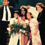 Kenya Moore Instagram - #TBT The second happiest moment of my life was the day I was crowned #MISSUSA making me the second Black woman to be bestowed this honor. My dad, little brother, sister, and my Grandmother (who raised me and no longer with us) were there by my side in this photo. Even though the organization has never invited me back to judge or host subsequent pageants, kind of hard to erase history ❤️ #Godisgood #missusa #pageants #blackexcellence #kenyamoore #kenya #beauty #90s