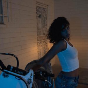 Kiana Ledé Instagram - I haven’t given KIKI the album her moment! Not only was it my birthday on the 3rd but also the 4th anniversary to my first born🥹 
Gettin to shoot this at my childhood home in south phoenix and eatin a bag of hot Cheetos with chamoy on the roof made me feel like a bad lil kid again lol
I appreciate the random guy that lives there now for lettin me do that.
KIKI ended up comin out in a time we all had to lock ourselves in the house but this album took me places I could never imagine🖤
(Corny but real af lol)
Thank you so much for everythin KIKI🤍