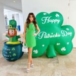 Kimberly Guilfoyle Instagram - Celebrating my Irish/Puerto Rican heritage on this Saint Patrick’s Day 2024, American style! Wearing green, spreading joy and honoring tradition. 🇺🇸☘️ @AdmiralsCoveLife #SaintPatricksDay#AdmiralsCove #Slainte Dress @Simkhai Heels @Prada Purse @Prada Earrings @CameronPatrickNeth
