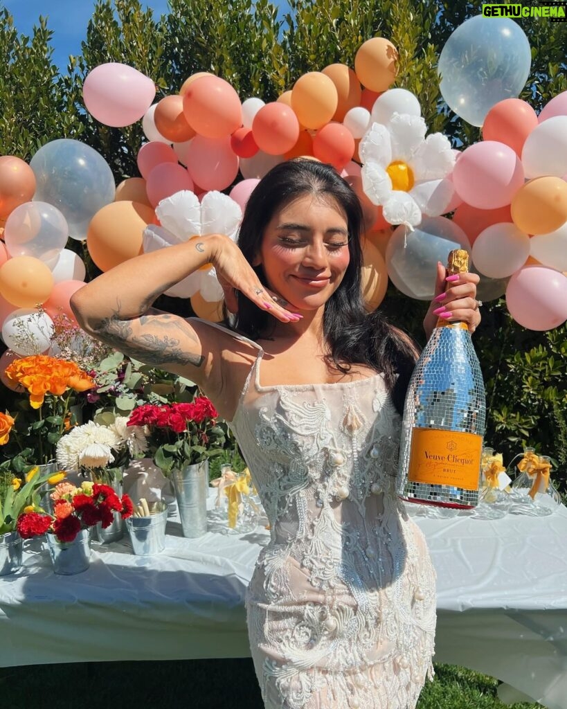 Kirstin Maldonado Instagram - okay SO BEHIND but still tracking down photos from the most amazing bridal shower ever!!!! love is truly in bloom!!! thank you to my beautiful and wonderful MOH bestie for the most beautiful day 🥹🥹🥹❤️❤️ @saleena.hope I love you so so so much!!! thank you @sarahscrossland @loganjaxxson for helping setting up, thank you family for flying in, thank you incredible friends for coming and making my day so special!!! 🥹 it’s getting SO REAL now everyone haha. love you all so much 🥹❤️ iconic fashion moment thank you to @lagartier for my GARTER!!!! okay I feel like this absolutely made the outfit, I mean how stunning is it!?!! SO CUTE. plus my fav champagne and bedazzled?! she gets me!! an angel 🤩🥹❤️ and this @kimkassascouture mini just a happy sneak peak of what’s to come 🥰 bridal era is ✨✨✨☀️☀️☀️