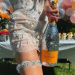 Kirstin Maldonado Instagram - okay SO BEHIND but still tracking down photos from the most amazing bridal shower ever!!!! love is truly in bloom!!! thank you to my beautiful and wonderful MOH bestie for the most beautiful day 🥹🥹🥹❤️❤️ @saleena.hope I love you so so so much!!! thank you @sarahscrossland @loganjaxxson for helping setting up, thank you family for flying in, thank you incredible friends for coming and making my day so special!!! 🥹 it’s getting SO REAL now everyone haha. love you all so much 🥹❤️ iconic fashion moment thank you to @lagartier for my GARTER!!!! okay I feel like this absolutely made the outfit, I mean how stunning is it!?!! SO CUTE. plus my fav champagne and bedazzled?! she gets me!! an angel 🤩🥹❤️ and this @kimkassascouture mini just a happy sneak peak of what’s to come 🥰 bridal era is ✨✨✨☀️☀️☀️