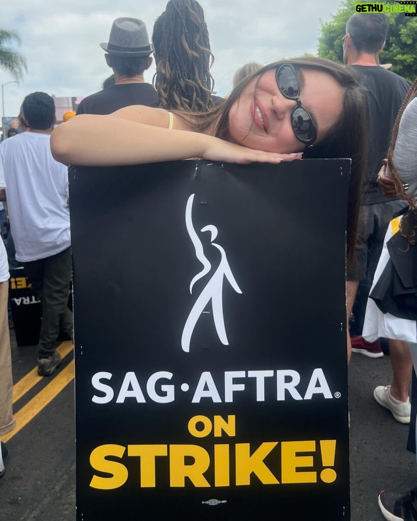 Landry Bender Instagram - I strike for the 10 year old me that joined the union and the 80 year old me that hopes to still be working. The majority of @sagaftra member’s job is simply AUDITIONING for the next job - and the majority of members don’t qualify for health insurance. (please consider donating to @sagaftrafound!) We marched this morning for unions in every field - we need fair wages and contracts. My favorite quote today from @msjoelyfisher: “What you are doing right now is bigger than any role you’ll ever play.” 🪧 #sagaftrastrong #unionstrong