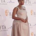 Lashana Lynch Instagram - Grey leather for last nights BAFTA TV Awards. Shout out to @karenclarkson and @16arlington for this custom moment. 🩶✨