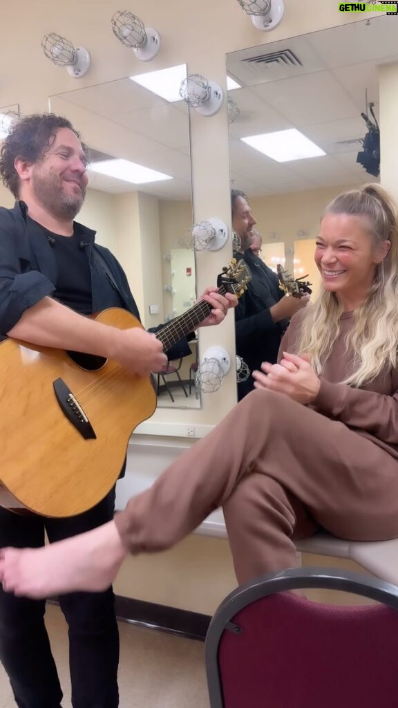 LeAnn Rimes Instagram - the 90’s country music challenge reminded me (and by the comments, a lot of you) how much i loved this song!! i couldn’t resist grabbing greg for a little backstage jam before for the show yesterday… (ignore shamus rushing us in the background 🙄😂) i love you @deanatunes #strawberrywine #cover #backstage #thestorysofartour #countrymusic #90s #deanacarter #throwback