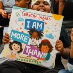 LeBron James Instagram - LeBron’s new book, #IAmMoreThan, is inspiring his I Promise students & students all over! 🙌🏾🖤👑