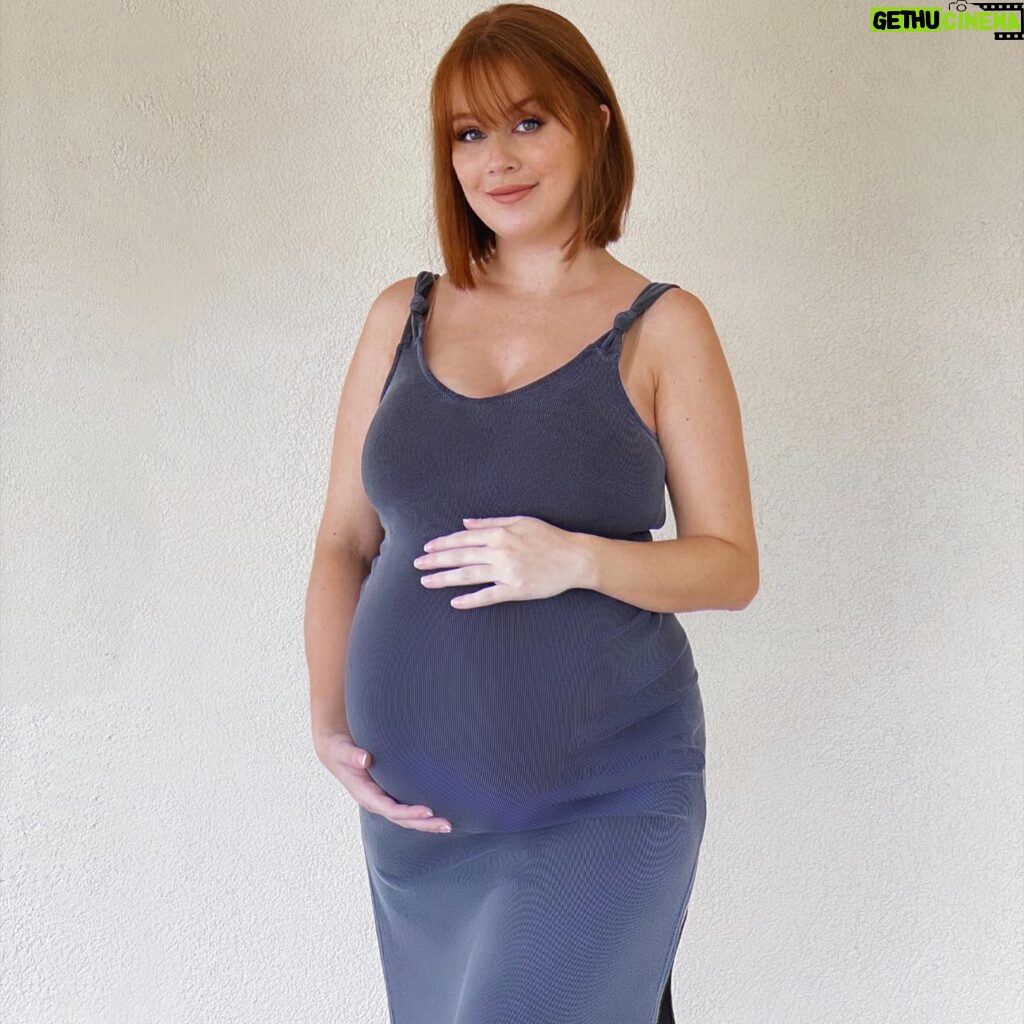 Leanna Decker Instagram - This body may be stretching this pre-pregnancy dress to its limits, but hey, it still fits, so yay! 🤣 Don't know how many more days I have left to document this bump 💙 we’re ready whenever you’re baby boy! ✨ #pregnancyjourney #thirdtrimester #stretchbabystretch #patientlywaiting