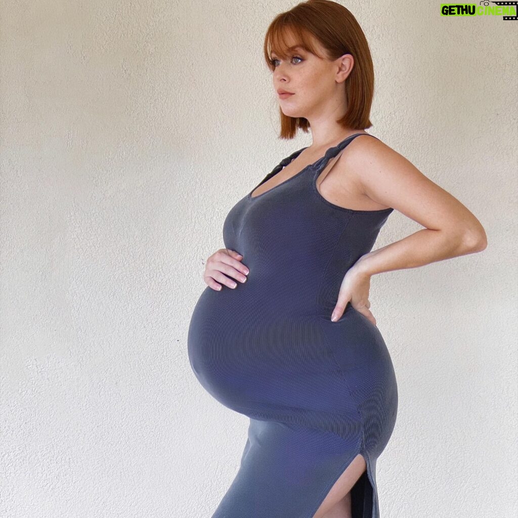 Leanna Decker Instagram - This body may be stretching this pre-pregnancy dress to its limits, but hey, it still fits, so yay! 🤣 Don't know how many more days I have left to document this bump 💙 we’re ready whenever you’re baby boy! ✨ #pregnancyjourney #thirdtrimester #stretchbabystretch #patientlywaiting