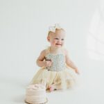 Lindsay Arnold Instagram - Happy 1st birthday to our sweet Junie 🫶 can't imagine life without this girl! She is as sweet as they come, gives the best "snuggles", and brings so much joy to our lives every day. I think back to one year ago today when she made her (somewhat terrifying) entrance into this world and just feel so incredible blessed that she is here and that she is ours 🥹 we love you so much Junie Bug! #firstbirthday #firstbirthdayphotoshoot #babygirlturnsone