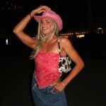 Lindsay Arnold Instagram - Stagecoach Day 2 💕 I was going for Barbie cowgirl how did I do? #stagecoach #cowgirls #cowgirl