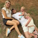 Lindsay Arnold Instagram - IRONMAN 70.3 👏🏼 Sam has trained so hard the past 6 months to prepare for his very first Ironman race and I can't even express how proud I was watching him cross that finish line 🏁 Sage and June were so excited about it too and both wanted to snuggle him immediately after! We love our guy and wow I am just so impressed with everyone who did this race it is no joke! #ironmantraining #ironman #stgeorgeironman