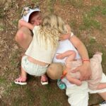 Lindsay Arnold Instagram - IRONMAN 70.3 👏🏼 Sam has trained so hard the past 6 months to prepare for his very first Ironman race and I can't even express how proud I was watching him cross that finish line 🏁 Sage and June were so excited about it too and both wanted to snuggle him immediately after! We love our guy and wow I am just so impressed with everyone who did this race it is no joke! #ironmantraining #ironman #stgeorgeironman
