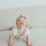 Lindsay Arnold Instagram - Happy 1st birthday to our sweet Junie 🫶 can't imagine life without this girl! She is as sweet as they come, gives the best "snuggles", and brings so much joy to our lives every day. I think back to one year ago today when she made her (somewhat terrifying) entrance into this world and just feel so incredible blessed that she is here and that she is ours 🥹 we love you so much Junie Bug! #firstbirthday #firstbirthdayphotoshoot #babygirlturnsone