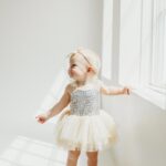 Lindsay Arnold Instagram - Happy 1st birthday to our sweet Junie 🫶 can't imagine life without this girl! She is as sweet as they come, gives the best "snuggles", and brings so much joy to our lives every day. I think back to one year ago today when she made her (somewhat terrifying) entrance into this world and just feel so incredible blessed that she is here and that she is ours 🥹 we love you so much Junie Bug! #firstbirthday #firstbirthdayphotoshoot #babygirlturnsone