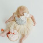 Lindsay Arnold Instagram - Happy 1st birthday to our sweet Junie 🫶 can't imagine life without this girl! She is as sweet as they come, gives the best "snuggles", and brings so much joy to our lives every day. I think back to one year ago today when she made her (somewhat terrifying) entrance into this world and just feel so incredible blessed that she is here and that she is ours 🥹 we love you so much Junie Bug! #firstbirthday #firstbirthdayphotoshoot #babygirlturnsone