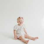 Lindsay Arnold Instagram - Happy 1st birthday to our sweet Junie 🫶 can't imagine life without this girl! She is as sweet as they come, gives the best "snuggles", and brings so much joy to our lives every day. I think back to one year ago today when she made her (somewhat terrifying) entrance into this world and just feel so incredible blessed that she is here and that she is ours 🥹 we love you so much Junie Bug! #firstbirthday #firstbirthdayphotoshoot #babygirlturnsone