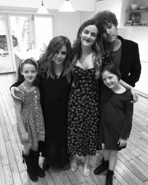 Lisa Marie Presley Instagram - Mama Lion with cubs ❤️🖤💚💙🦁🥰