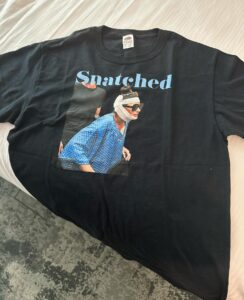 Loren Brovarnik Instagram - When they ask how you’re feeling the day after surgery… you send them this and say “like a snatched icon” ✨ Credit to Alex for finding the muumuu 🫶🏼 Credit to our producer for creating the gem of a tshirt! #snatched #icon #mommymakeover #nextchapter #fashion