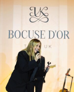 Louise Redknapp Instagram - Thank you @bocusedoruk for a fab evening of gorgeous food and fundraising for The Cancer Awareness Trust.

It was a pleasure to perform for everyone at  Raffles London at The OWO last night 🤍 xxx 

Suit: @ysl 
Lace body: @wardrobe.nyc 
Shoes: @ysl 

📸 photo 5 & 6: @jodihindsphotographer