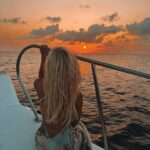 Lucie Donlan Instagram – Sailing into the sunset.. 🌊 
What’s your favourite? sunset or sunrise? ☀️⬇️