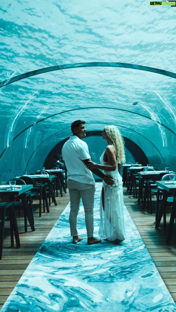 Lucie Donlan Instagram - Come with me to the Underwater restaurant in @hurawalhi 🌊 - Honestly this was by far the most incredible experience I’ve ever had. Luke treated me to this beautiful dining experience for my Birthday, and I was so emotional as this was the best meal, views and whole experience I’ve ever had in my life. The feeling of enjoying a luxury 5 course meal paired with wines in my favourite place in the world…the ocean💙 This memory will be in my heart forever, it was so special. I also loved dressing up for this occasion, a barefoot mermaid was the feeling so I’ve linked my outfit details below. 🐚 📍 @hurawalhi 🌊 Outfit details : White dress : @thegiftedsisters_ Jewellery : @sophiacjewelry Red dress : @ohpolly ( This is not it is not a tank or aquarium.) ❗️