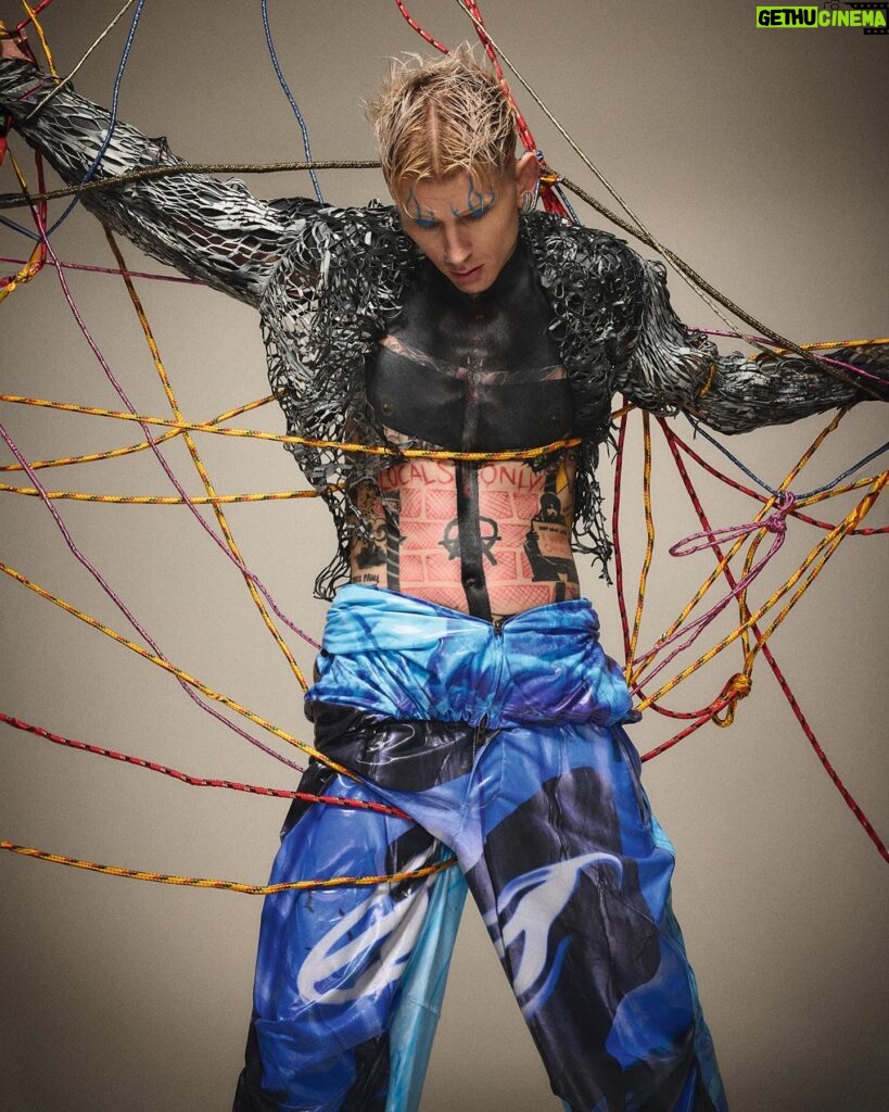 Machine Gun Kelly Instagram - more drip💧@machinegunkelly for the liquid issue of @kingkongmagazine. photographer: @kennethcappello styling: @thejordanboothe grill artist @alligatorjesus assist: @elisa_jane hair: @dimitrishair makeup: @ghost_artistry_ set @_bradenyoung studios: @milk