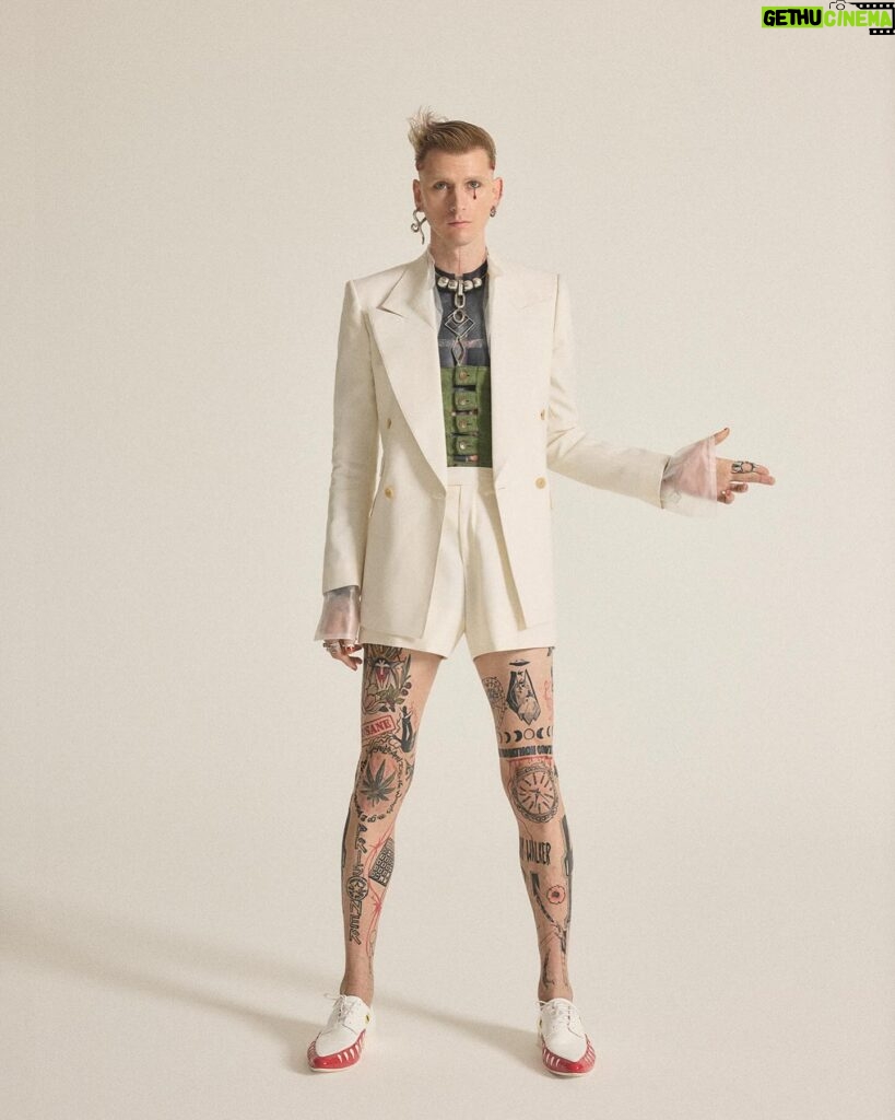 Machine Gun Kelly Instagram - more drip💧@machinegunkelly for the liquid issue of @kingkongmagazine. photographer: @kennethcappello styling: @thejordanboothe grill artist @alligatorjesus assist: @elisa_jane hair: @dimitrishair makeup: @ghost_artistry_ set @_bradenyoung studios: @milk