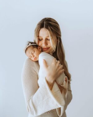 Madisson Hausburg Instagram - Happy Mother’s Day (and happy three months to Sunday)! 🩷 

Three years ago on this holiday, I announced to my family that I was pregnant and we all celebrated my first Mother’s Day together. After Elliot died, Mother’s Day became a very heavy day for me. I never questioned or doubted my title of mom, but motherhood is so much more complicated and confusing without a living child to hold. Today, I am so grateful to celebrate being a mom to both of my children even if it’s not in the way I hoped…with both of my babies earthside. And although my role as mom looks drastically different now than in years past, my love for Elliot and Sunday remains as strong as ever. 

Sending extra love and a big hug to those whose hearts feel heavy today. To those who are missing their mothers, to those who are missing their children, and to those whose arms feel so terribly empty…I see you. You are not alone. 

And as always…I miss you so so very much, my sweet Elliot. Today and everyday. Thank you for making me a mom🪽