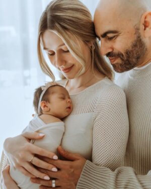 Madisson Hausburg Instagram - Happy Mother’s Day (and happy three months to Sunday)! 🩷 

Three years ago on this holiday, I announced to my family that I was pregnant and we all celebrated my first Mother’s Day together. After Elliot died, Mother’s Day became a very heavy day for me. I never questioned or doubted my title of mom, but motherhood is so much more complicated and confusing without a living child to hold. Today, I am so grateful to celebrate being a mom to both of my children even if it’s not in the way I hoped…with both of my babies earthside. And although my role as mom looks drastically different now than in years past, my love for Elliot and Sunday remains as strong as ever. 

Sending extra love and a big hug to those whose hearts feel heavy today. To those who are missing their mothers, to those who are missing their children, and to those whose arms feel so terribly empty…I see you. You are not alone. 

And as always…I miss you so so very much, my sweet Elliot. Today and everyday. Thank you for making me a mom🪽