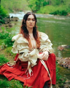 Malinda Kathleen Reese Instagram - Even woodland princesses need some time to rest and reflect ✨🌀 have you saved Everything I Need yet? 🥰

📷 @wjsandel 
👚 @annieleona__