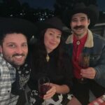 Mamrie Hart Instagram - I learned how to put butane in my Brulé torch, and now I’m a monster. 🤠Threw a Spaghetti Western with my girl @jaclynrjohnson last night and it made me GIDDY (up). Happy birthday @silvaaalexander 🍝 And yes that is spray painted pasta shell turned into a bolo tie. She loves a theme, y’all!