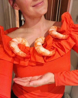 Mamrie Hart Instagram - Last night felt like the early 2010’s and my camera quality reflects that. Yes! I am wearing three cat toys to be shrimp cocktail. No, I didn’t realize they were filled with cat nip when I ordered them. Luckily, I got home safe without being pounced on by mountain lion. 🍤 @kiwilovesyou threw a rager and I am in bed eating curry at 1 PM.
