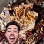 Manny MUA Instagram - #The99StorePartner Call me Chef Manny 🧑🏼‍🍳 I recreated Laura’s Holiday Bark using all ingredients all from The 99 Store! How do you all think I did?! This year head to your local 99 Store for all your Holiday shopping needs because we all know we love them deals this season! @99centsonly #The99Store #99CentStoreFinds #HolidayBark
