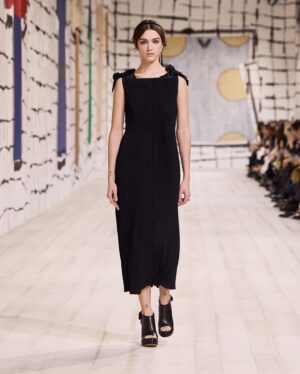 Maria Grazia Chiuri Instagram - With their ability to tame and transform textiles, shape silhouettes and control volumes, pleating and other forms of fabric manipulation play an important role throughout the new #DiorCouture Spring-Summer 2024 collection by @MariaGraziaChiuri. A white crêpe column exemplifies this type of #DiorSavoirFaire with its rows of precise pleats smocked to secure the positioning of the neckline and waist, while another draped dress is ingeniously gathered into a basketweave panel at the front. In red moiré faille, a pleated full skirt is paired with an update on the #DiorBarJacket to reinvent the original and peerless New Look icon.