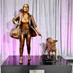 Mariska Hargitay Instagram - #AD I’m proud to partner with @Purina in support of the Purple Leash Project! On May 6th, Purina unveiled a new statue, Courageous Together, by artist Kristen Visbal, to shine a light on a key barrier that many survivors of domestic abuse with pets face—there aren’t enough pet-friendly domestic violence shelters. In collaboration with the nonprofit @redroverorg Purina created the Purple Leash Project to establish a world where no one is trapped in abuse because they can’t take those they love with them. #PurinaPartner #PurpleLeashProject 💜
